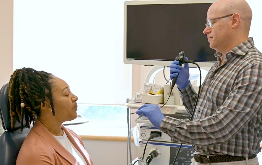 Dr Brian with patient