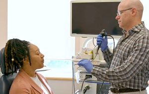 Dr Brian with patient